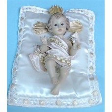 Christ Child on Pillow with Gold Accents